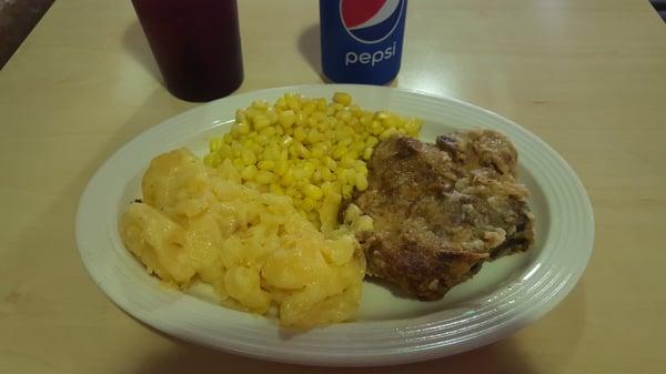 The pork chop, potatoes au gratin, and corn special.