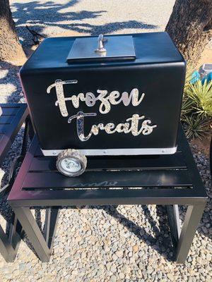 Here's our black & silver mini popsicle cart.  It holds up to 70 frozen treats and is perfect for your backyard party or a boy's birthday!