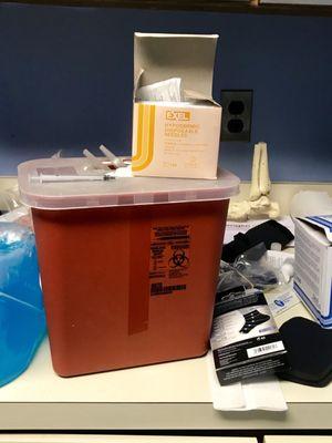 JUN 2018 Cluttered countertop in supply room we were put into before seeing the doctor...