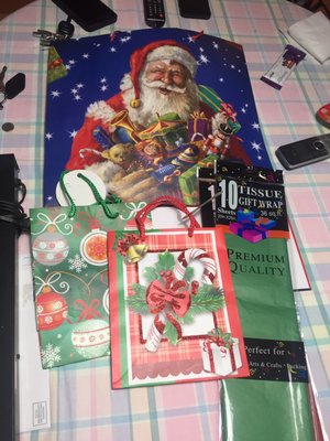 Large Santa bag,  2 greeting cards,  2 wrapping tissues...