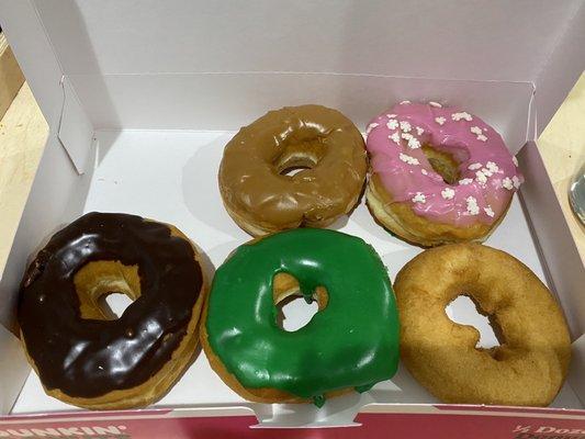 Chocolate dipped donut, maple dipped donut, old fashioned, "Holiday" dipped donut, and Strawberry Sprinkled Donuts