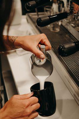 Foamy delicious latte pours