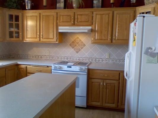 Kitchen Remodel : New Backsplash, Cabinets, and  Countertop.