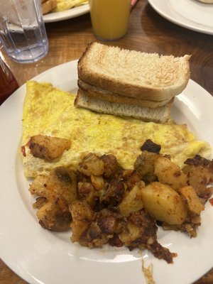 Omelet with home fries.