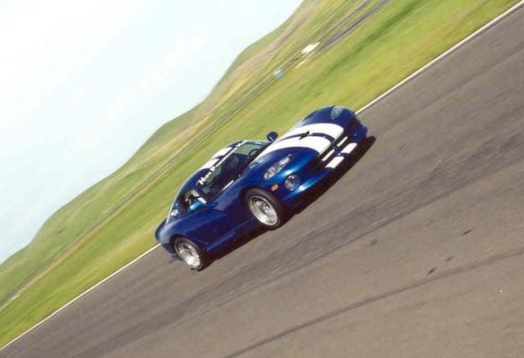 Rich on Sears Point Raceway with his 1996 Dodge Viper GTS, giving someone an E ticket ride!