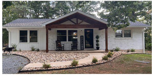 Concrete sidewalk install ,concrete front porch install ,river rock and edging installation