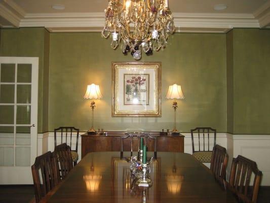 Textured Olive Green adds drama to a classic dining room