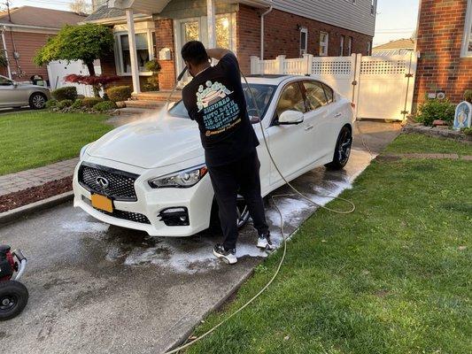 Prepping this Infiniti for paint correction.