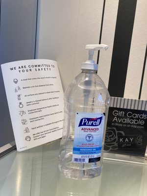 Hand sanitizer and COVID-19 policies at main entrance