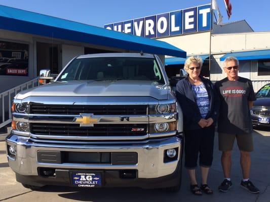 Tom and his wife in front of there 2015 Chevrolet Silverado 2500 6.6 Diesel Crew Cab pickup