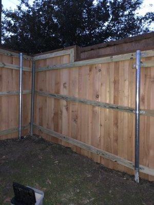 6' board on board fencing with 2x6 top cap (hoa required fencing)