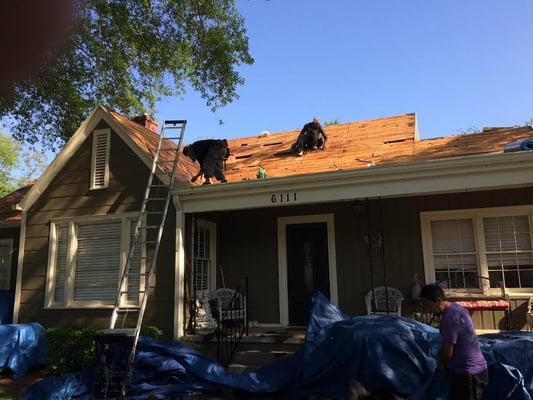 Roof replacement with complete roofing tear-off