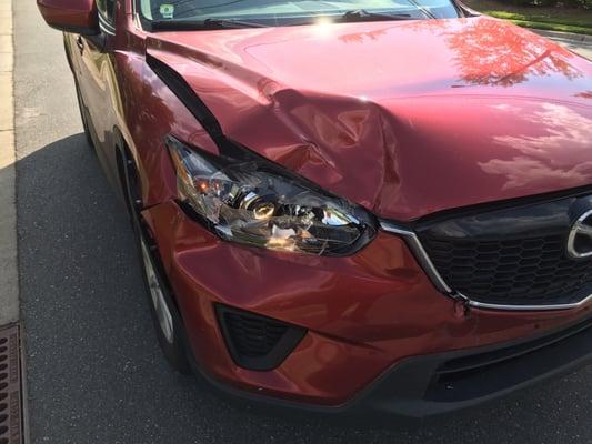 Passenger side headlight and quarter panel damage