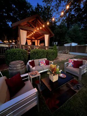 Stunning sectional and bourbon barrel decoration for Havana Night Party