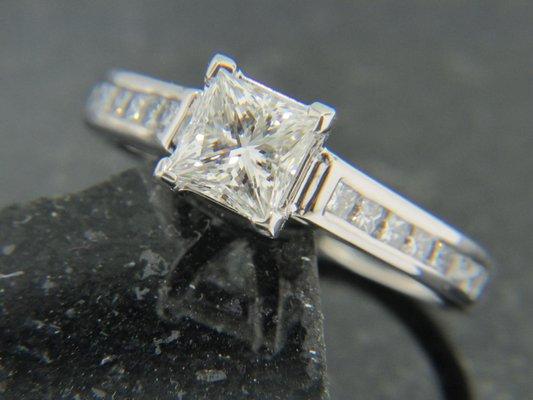 Princess Cut Center with Channel Set Princess Side Stones Engagement Ring