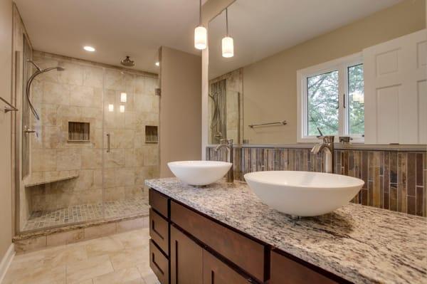 This Bathroom has been completely remodeled.  Large Shower, Granite Countertops.  Tile Floors.