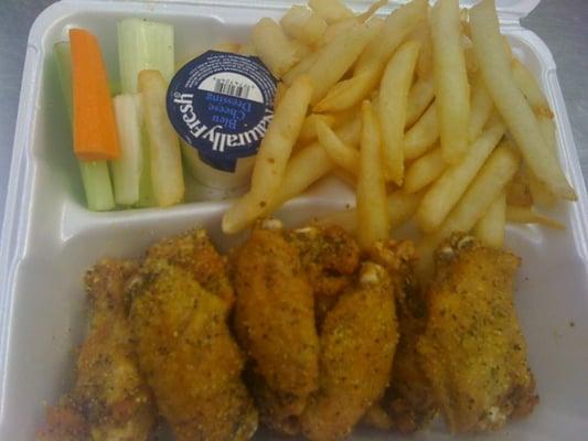 Chicken Wings ( wet lemon pepper sauce) and Fries