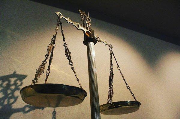 Scales of Justice in our law firm