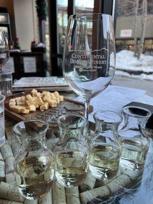 White wine flight and cheese board we set up as the cheese board comes in packaging