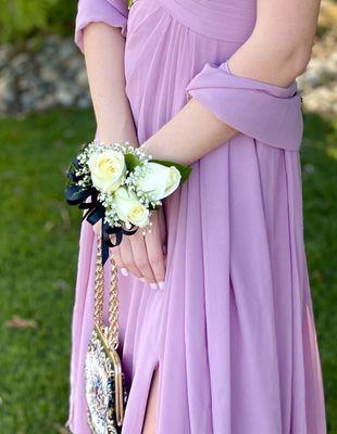 Prom. Corsage. Marvelous, fresh roses. Excellent wristlet. Nicely done.