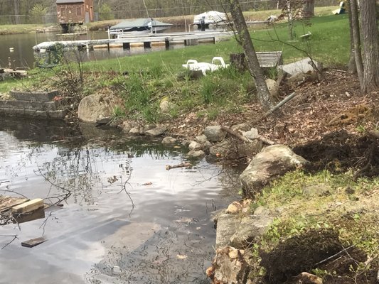 Natural stone wall swains lake before and after