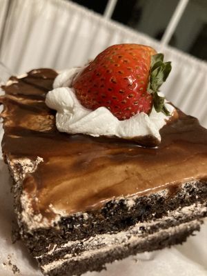 I guess - Coffee cream chocolate cake with strawberry on top.