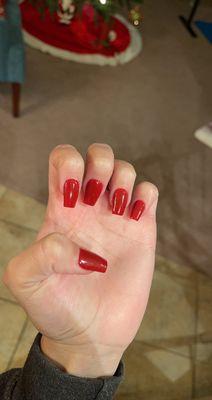 Dark red nails.