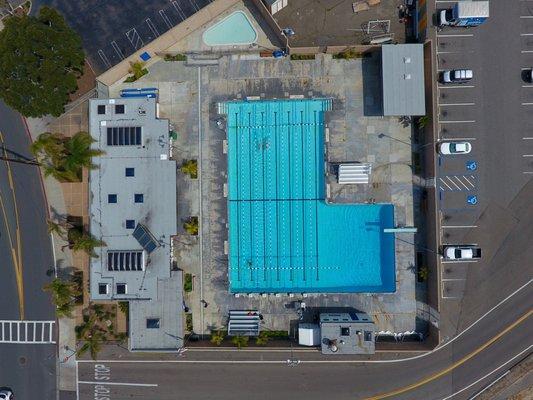 Check us out from a drone! We use our back entrance during lap swim and evening rentals.  For rec swim hours, please enter through the front