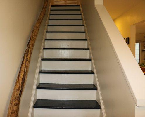 An easy update to stairs with old carpet - Remove carpeting and paint with 2 shades of paint. Complete change for the better!