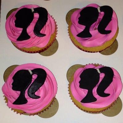 Customized gluten free Barbie silhouette cupcakes.  Call to order.