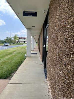 Walkway from the class. The buildings are a little rundown, but the inside is nice.