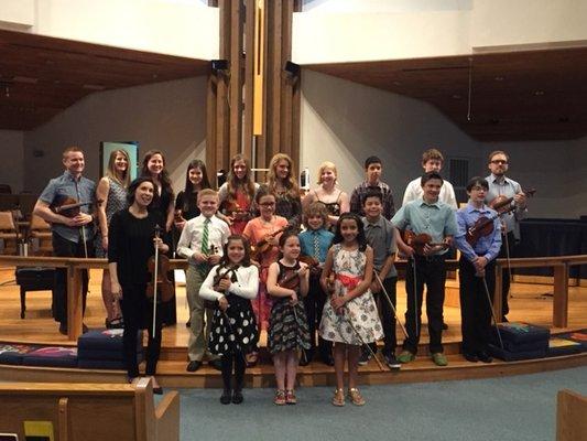 Tori with students at a studio recital