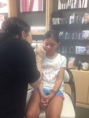 My 8 year old getting her ears pierced!