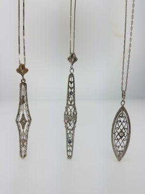 Vintage estate 14kt or Platinum pendants from the past are available today at Robert Haack Diamonds.