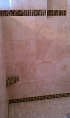 stone and glass tile walk-in shower