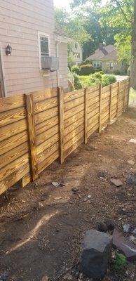 Work in progress, charred custom fence.