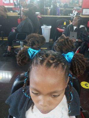 Children styles loc maintenance wash, retwist and style.