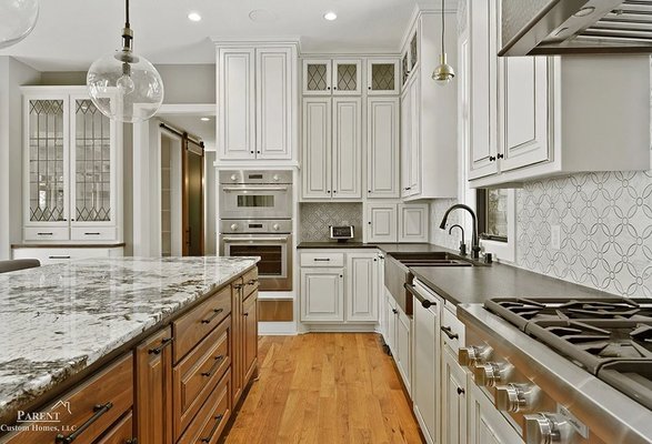 Custom Kitchen cabinets designed for client with painted and stained cabinets in mind.