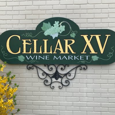 Cellar XV Wine Market sign on front of our building