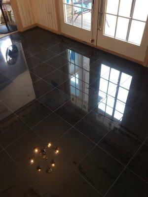 This beautiful granite floor was uncovered under carpet and restored to its original beauty!