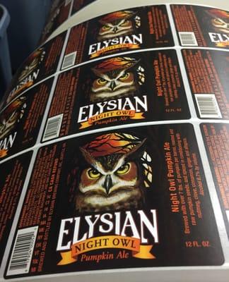 Flexographic label rolls for Elysian Brewing Company's Night Owl Pumpkin Ale (available August through October) taken on August 21, 2015