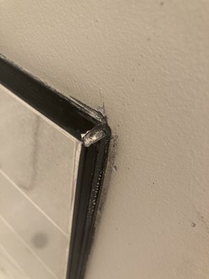 Caulking everywhere, corners of metal edging doesn't match up, looks horrible.