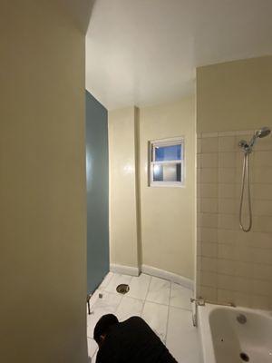 Repair drywall and paint 2 bathrooms