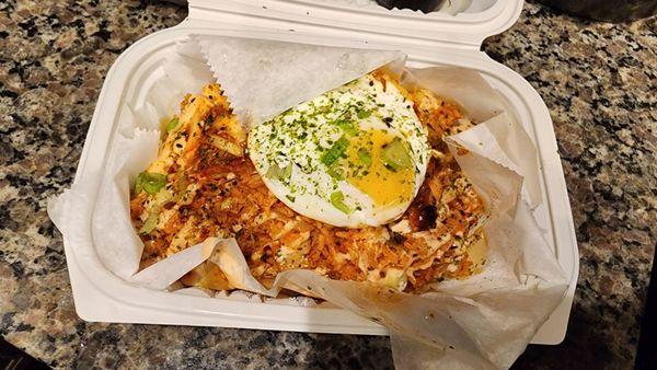 Kimchi fried rice ($13.99); small container of spicy pork on the side (not pictured, $2.99)