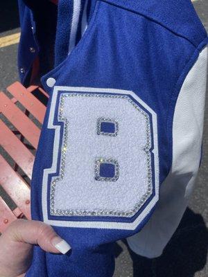 We added some Glitz & Bling to a Brewer High School Students Jacket!