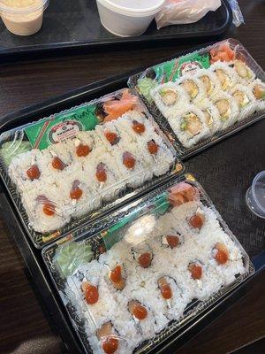 Top left: Spicy Tuna Roll Top right: Shrimp Tempura Roll Bottom left: Spicy Salmon Roll