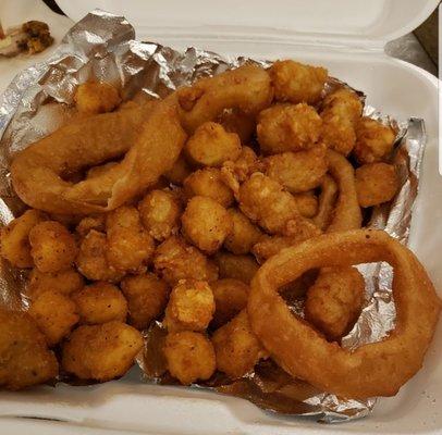 Part of combo platter all mixed together, soggy and greasy. Popcorn chicken, mushrooms, onion rings and tater tots.