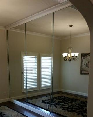 Wall mirrors with 2" Mirror beveled strips between the mirror seam.