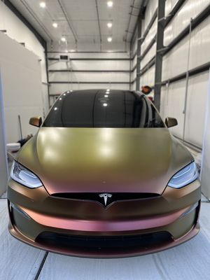 Tesla Model X Plaid. Wrapped in Avery Satin Rising Sun. Wrapped by Detailtopia.