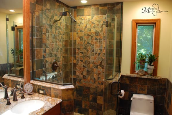 Marble bathroom with matching window sill and knee walls